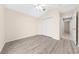 Bright bedroom with vaulted ceiling, closet, and luxury vinyl plank flooring at 3303 Ann Arbor Ct, St Cloud, FL 34772