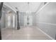 Elegant dining room featuring a chandelier, neutral walls, and tile flooring at 3303 Ann Arbor Ct, St Cloud, FL 34772