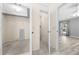 Hallway view showing closet, bathroom, and open living space leading to a pool at 3303 Ann Arbor Ct, St Cloud, FL 34772
