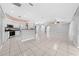 Open-concept living space showcasing the kitchen with an island at 3303 Ann Arbor Ct, St Cloud, FL 34772