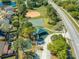 Aerial shot featuring a community park with playground, ball field, and basketball court at 3303 Ann Arbor Ct, St Cloud, FL 34772