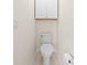 Cozy powder room with toilet and cabinet, perfect for guests at 3303 Ann Arbor Ct, St Cloud, FL 34772