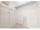Spacious walk-in closet featuring white wire shelving and ample storage space at 3303 Ann Arbor Ct, St Cloud, FL 34772