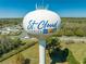 View of the St. Cloud, Florida water tower in a landscape of trees, roads, and residences at 3303 Ann Arbor Ct, St Cloud, FL 34772