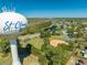 View of the St. Cloud, Florida water tower overlooking residences and the community baseball and basketball courts at 3303 Ann Arbor Ct, St Cloud, FL 34772