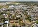 Aerial view of a community with nearby shopping centers, providing easy access to amenities at 425 S 12Th St, Lake Wales, FL 33853