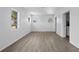 A bright bedroom with fresh paint and modern wood-look flooring at 425 S 12Th St, Lake Wales, FL 33853