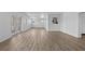 A spacious living room with ample natural light and modern wood-look flooring at 425 S 12Th St, Lake Wales, FL 33853