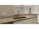 Close up of kitchen island and granite countertop at 429 Lark Ct, Poinciana, FL 34759