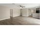 A view of the open-concept living room, with sleek flooring and neutral paint at 429 Lark Ct, Poinciana, FL 34759