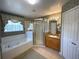 Elegant bathroom with soaking tub and separate glass shower at 4602 Cumbrian Lakes Dr, Kissimmee, FL 34746