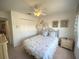 Comfortable bedroom featuring a twin bed and neutral decor creating a soothing atmosphere at 4602 Cumbrian Lakes Dr, Kissimmee, FL 34746