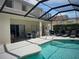 Spacious screened-in pool area with plenty of space for entertaining and lounging at 4602 Cumbrian Lakes Dr, Kissimmee, FL 34746