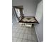 Eat-in kitchen with tiled flooring, a large window, and dining table with seating at 4625 Weston Rd, Bartow, FL 33830