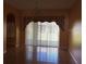 Bright dining area featuring tile floors and sliding glass doors to the backyard at 516 Brentford Ct, Kissimmee, FL 34758