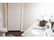 Bathroom featuring a vanity with granite countertop, and storage, complemented by modern fixtures at 5364 Diplomat Ct # 106, Kissimmee, FL 34746