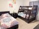 Bedroom with twin bed, bunk beds, and decor at 5364 Diplomat Ct # 106, Kissimmee, FL 34746