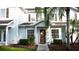 Charming two-story townhome with a well-maintained lawn, and a welcoming front entrance at 5364 Diplomat Ct # 106, Kissimmee, FL 34746