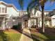 Charming two-story townhome with a well-maintained lawn, and a welcoming front entrance at 5364 Diplomat Ct # 106, Kissimmee, FL 34746