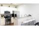 Modern kitchen with stainless steel appliances and a breakfast bar, perfect for casual dining at 5364 Diplomat Ct # 106, Kissimmee, FL 34746