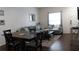 A cozy living room with couches, a coffee table, and a dining table with chairs at 5364 Diplomat Ct # 106, Kissimmee, FL 34746