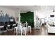 Inviting lobby with modern decor, comfortable seating, and a skyline mural at 5364 Diplomat Ct # 106, Kissimmee, FL 34746