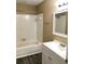 Bright bathroom with a tub and shower combination, and a single sink vanity at 539 Libby Rd, Babson Park, FL 33827