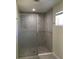 Beautiful bathroom featuring a glass shower with decorative tiles, providing a spa-like experience at 539 Libby Rd, Babson Park, FL 33827