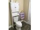 Bathroom featuring a toilet with storage over top at 539 Libby Rd, Babson Park, FL 33827
