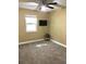 Bedroom features neutral walls, carpet flooring, and ceiling fan with overhead light at 539 Libby Rd, Babson Park, FL 33827