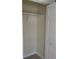 Walk in closet with shelving and door at 539 Libby Rd, Babson Park, FL 33827