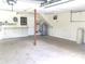 Spacious garage with built in shelving and an extra storage area for all your needs at 539 Libby Rd, Babson Park, FL 33827