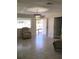 Living room with tile flooring and two chairs at 539 Libby Rd, Babson Park, FL 33827