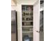 A pantry stocked with essentials offers ample storage space, enhancing kitchen organization at 539 Libby Rd, Babson Park, FL 33827