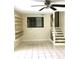 Room with tile flooring and shelving; stairs with stone accents lead to other floors at 539 Libby Rd, Babson Park, FL 33827