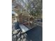 View of the shed with door and mesh at 539 Libby Rd, Babson Park, FL 33827
