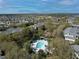 Community pool and recreation area surrounded by mature trees at 709 Lucaya Loop # 1203, Davenport, FL 33897