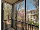 Balcony view overlooking a community green space at 709 Lucaya Loop # 1203, Davenport, FL 33897