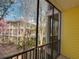 View from the balcony featuring mature trees at 709 Lucaya Loop # 1203, Davenport, FL 33897