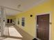 Exterior shot of the building with a yellow wall at 709 Lucaya Loop # 1203, Davenport, FL 33897