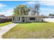 Charming single-story home featuring a well-maintained lawn and cozy curb appeal at 722 S 1St St, Lake Wales, FL 33853