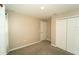 Neutral bedroom featuring a window, carpet and closet space for ample storage at 751 Jefferson St, Davenport, FL 33837