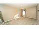 Neutral bedroom with plush carpet and natural light from a window at 751 Jefferson St, Davenport, FL 33837