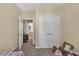 Bedroom view into ensuite bath and closet, neutral walls and carpet at 8103 Coconut Palm Way # 205, Kissimmee, FL 34747