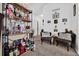 Cozy sitting room featuring a stocked bar with two decorative sitting chairs and carpet at 8103 Coconut Palm Way # 205, Kissimmee, FL 34747
