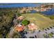 Aerial view of townhomes located near a beautiful lake and green spaces at 8507 Waterview Way, Winter Haven, FL 33884