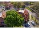 Aerial view of townhomes showcasing red tile roofs, landscaping, and convenient parking at 8507 Waterview Way, Winter Haven, FL 33884
