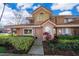 Charming townhome features a beautiful red tile roof and well-manicured landscaping at 8507 Waterview Way, Winter Haven, FL 33884