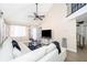 Open living room showcasing vaulted ceilings, a comfortable sofa, and a view of the loft at 8507 Waterview Way, Winter Haven, FL 33884