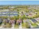 A beautiful home sits on a manicured lot in a quiet neighborhood with easy access to local amenities at 1004 Costa Mesa Ln, Kissimmee, FL 34744